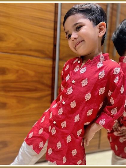 This festive season just got a whole lot cuter. This little one looks adorable in our soft and comfy red printed kurta, perfect for Rakhi or Diwali.