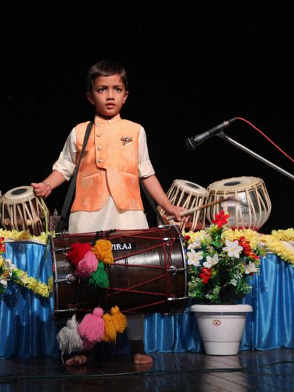 Another angle of our young dhol player, Aviraj Singh, showcasing his talent and stage presence.