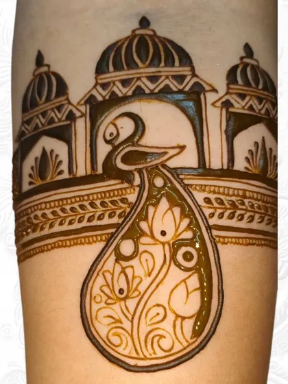 Another angle of the engagement arm band, highlighting the fine lines of the peacock and lotus design.