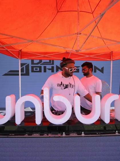 Posing for a shot at the Sunburn console. Being a part of such a well-known festival brand is a testament to my professionalism and skill as a DJ.
