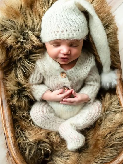 Just like a little bunny. This soft, knit outfit with a sleepy cap is perfect for creating a cozy and adorable look.