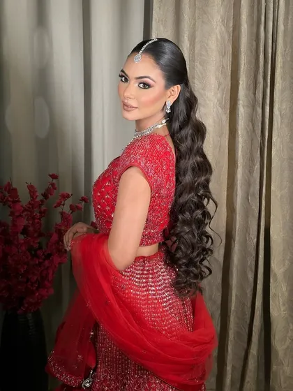 Another beautiful portrait of Komal. The entire look is elegant, modern, and perfect for a pre-wedding celebration.