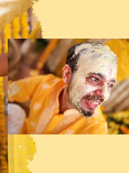 A candid moment from a Haldi ceremony, capturing the groom's playful reaction. It's these fun, unscripted moments that make the event memorable.