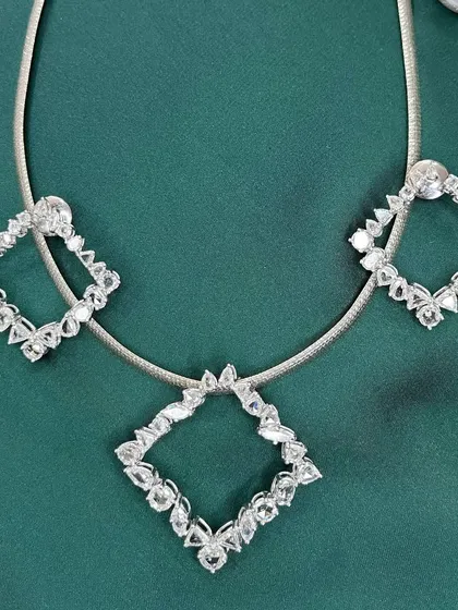 My rose-cut diamond necklace set with matching earrings embodies the perfect blend of tradition and modern elegance. The unique cut of the diamonds offers a vintage charm and a soft, romantic sparkle.