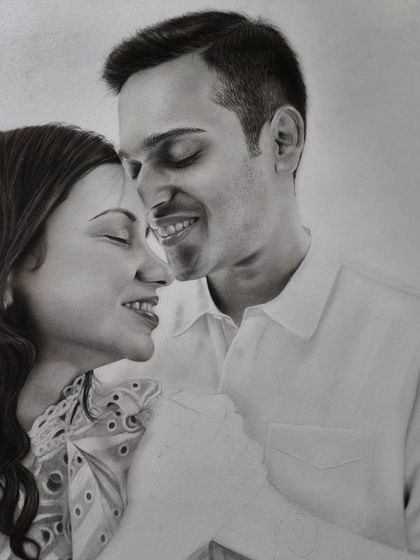 A progress shot of a couple portrait, showing the faces nearly complete.