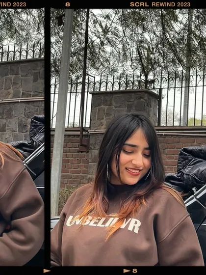 A smiling shot from the sweatshirt collage. This captures a genuine, happy moment, making the content more relatable.