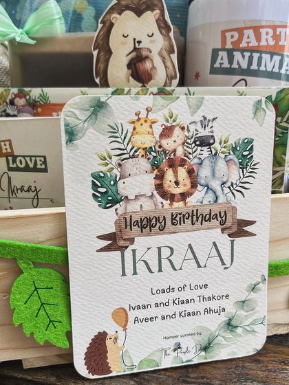 The personalized birthday card for the jungle hamper, featuring adorable animal illustrations.