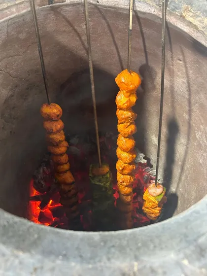 The heart of my North Indian live station is the tandoor. Here, you can see skewers of paneer and mushroom tikka getting that perfect char, ready to be served hot and smoky to guests.