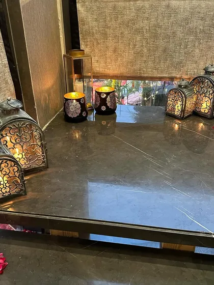 We love using lanterns to create a warm, inviting glow. These intricately designed Moroccan style lanterns were placed in a corner to create a cozy and ambient nook.