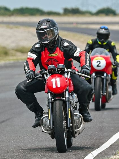 A rider demonstrating excellent body position while being followed by another student. We learn from each other.