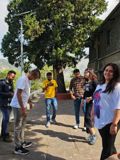 A candid moment of fun and games during the retreat. It's not all serious; we make sure to have plenty of time for laughter, play, and simply enjoying each other's company.