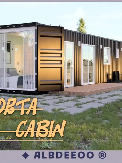 A sleek and modern porta cabin container house. This design features a full-glass wall at one end, creating a bright and open living space that connects with the outdoors.
