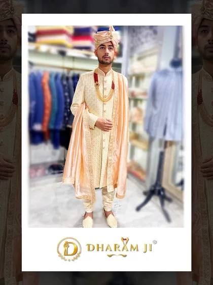 This groom chose a timeless look with a textured cream sherwani, a matching pagri, and a simple stole. The multi-layered pearl necklace adds a touch of royal elegance.