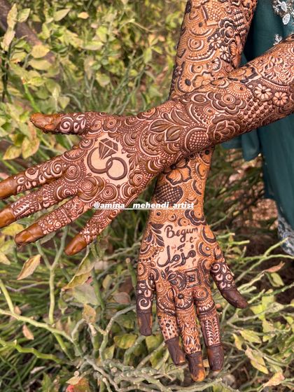 A full view of the engagement mehendi, showing how the personalized elements like the ring and the name are integrated into the overall floral design.