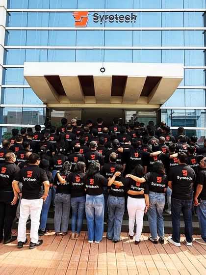 We stand together, facing the future. This photo symbolizes our unity and shared commitment to moving forward as one team.