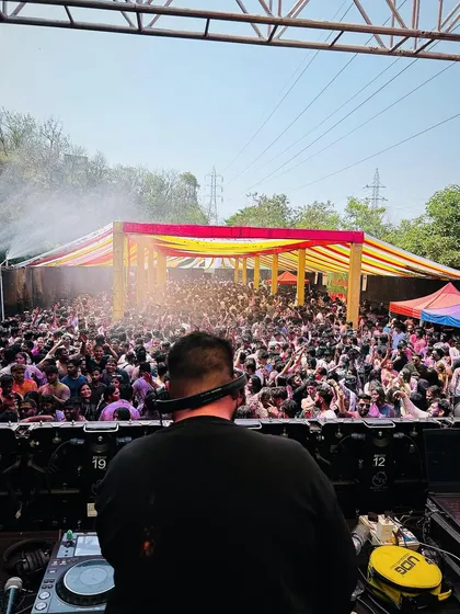 My view from the DJ booth, looking out at a sea of people at the Boom Color Festival. This is what a sold-out Holi party looks like.