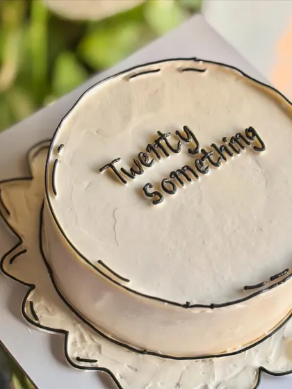 Black and white never tasted so sweet. This comic-style cake with black outlines gives a fun, 2D effect for a unique "twenty something" celebration.