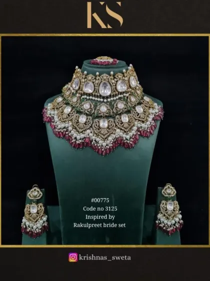 Inspired by Rakul Preet's wedding look, this bridal set features a grand, multi-layered choker with ruby-colored beads.