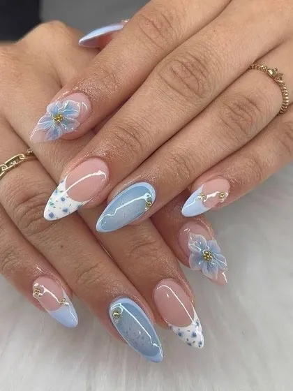 A soft and dreamy look for any occasion. This set features a baby blue base with delicate white polka dots and beautiful 3D floral accents for a touch of elegance.