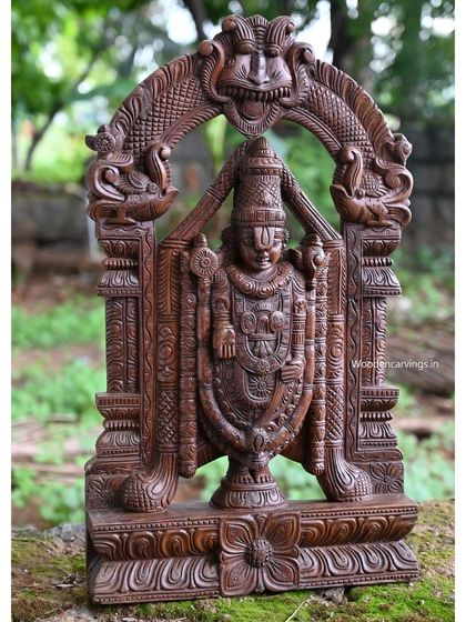 Another angle of the 26-inch Balaji statue, set against a natural green background.