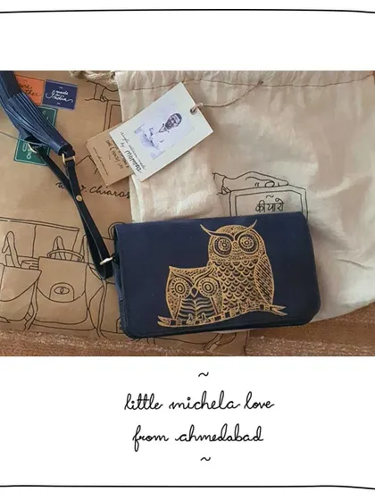 A beautiful Little Michela wallet for our patron Kruti in Ahmedabad. She customized it with a gold Gond painting of our signature owl motif on a deep Indus blue leather, making it a personal piece of art.