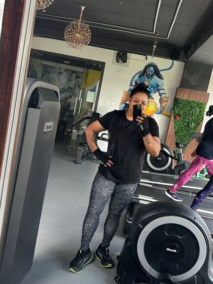 A quick post-workout selfie. As your coach, I'm right there with you, celebrating your progress and pushing you to be your best in our supportive gym environment.