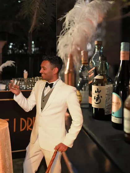 A guest enjoying the themed bar. The right atmosphere, decor, and service encourage guests to immerse themselves in the experience.