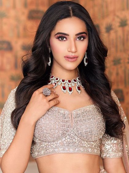 Another angle of the client, her ruby necklace and soft glam makeup creating a stunning combination.