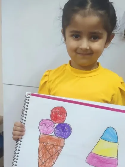 A sweet drawing of ice cream cones. This exercise helps children practice drawing shapes and using different colors to make their art look delicious.