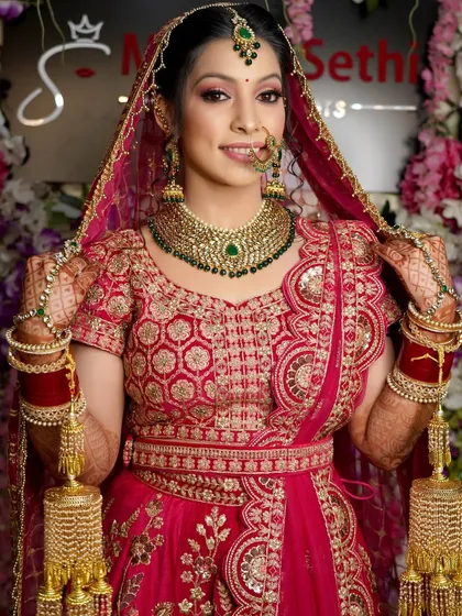 The complete look. A beautiful portrait of the bride holding her kalire, smiling, and ready for the ceremony. I make sure to capture that final, radiant look.