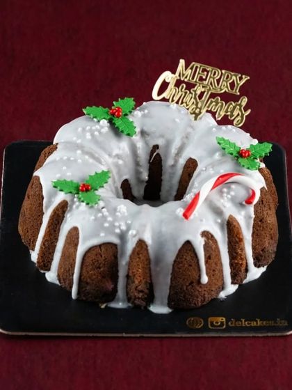 Our Glazed Plum Cake is a beautiful centerpiece for any Christmas celebration. The sweet glaze and festive decorations make it as lovely to look at as it is to eat.