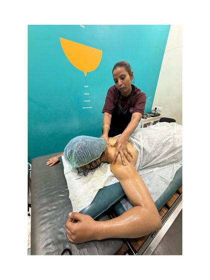 Here's Twinkle Chourasia during her shoulder and back massage. We focus on releasing tension from areas most affected by stress and long hours of work.