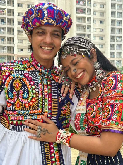 Grab your partner and get ready to dance! I love helping couples find coordinated outfits. This is a great example, showing how traditional embroidery and vibrant colors can create a stunning matching look for Navratri.