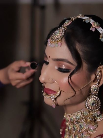 The final touch of eyeliner to create that perfect wing. It's all in the details.