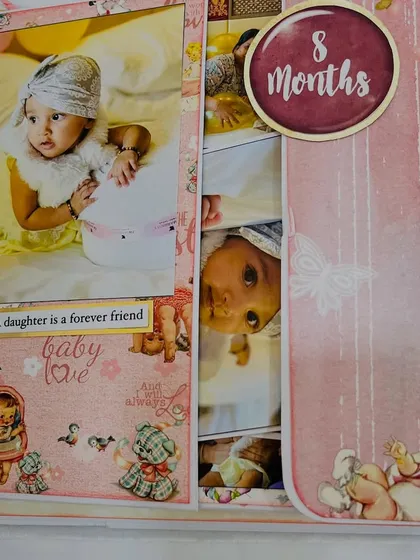 The '8 months' page, featuring a waterfall card design that reveals multiple photos with a single pull.