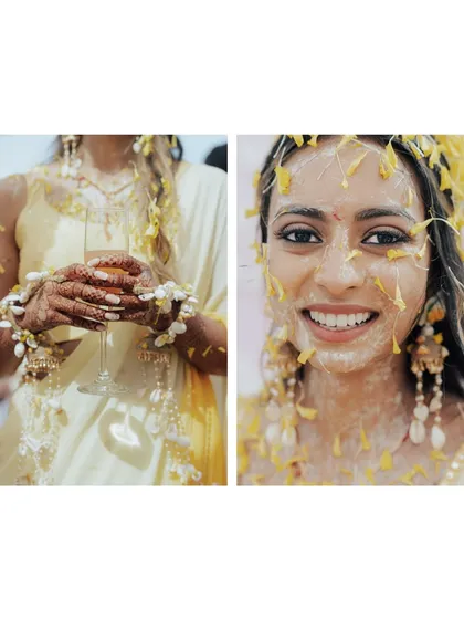 A close-up of the bride's hands, adorned with intricate henna and floral jewelry, holding a glass of champagne. A perfect blend of tradition and modern celebration.