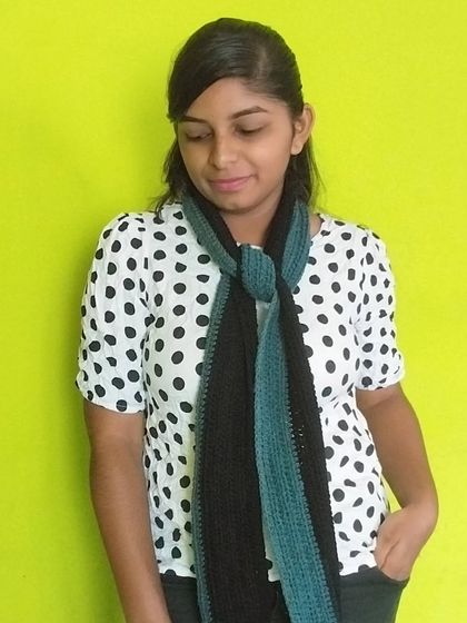 Another way to style the crochet muffler, tied in a simple knot.