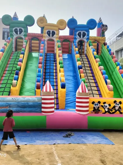 Another view of our large 6-slider model, highlighting its impressive size and vibrant colors. This structure is a centerpiece attraction for any large gathering.