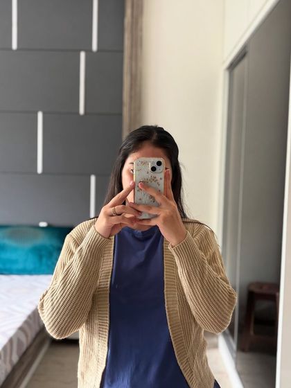 Our simple and elegant basic knitted cardigan in beige. This is a perfect neutral piece that goes with almost any outfit, offering a comfortable fit for sizes S to L.