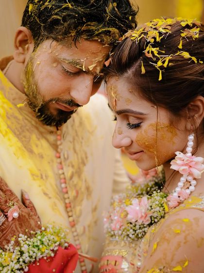 An intimate and colorful portrait from Avi and Pooja's haldi ceremony in Lucknow.