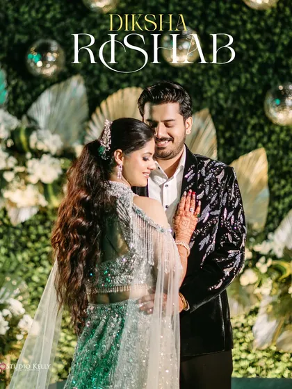A romantic embrace from the couple at their engagement party, with their names elegantly displayed.