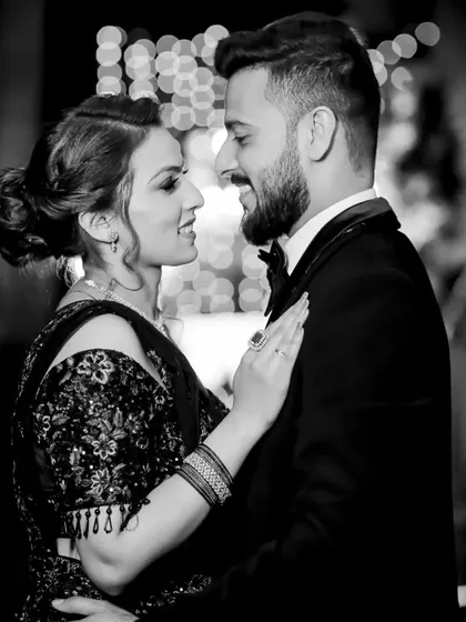 The black and white version of a beautiful reception portrait. This edit emphasizes their expressions and the romantic connection between them.