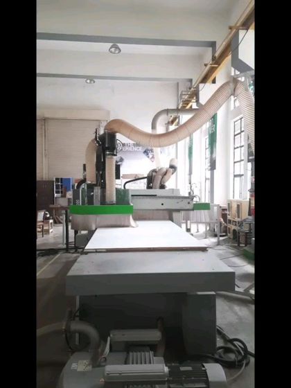 Our Biesse CNC router, a state-of-the-art machine capable of complex cutting, drilling, and shaping, is a centerpiece of our advanced woodworking program.