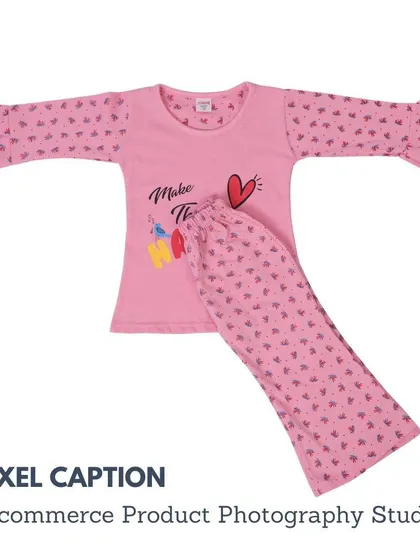 A full view of a pink kids' pajama set, shot in a flat lay style for e-commerce. Our studio is equipped for all types of children's clothing photography.