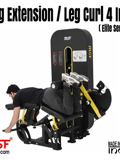 A user at the peak of the prone leg curl.