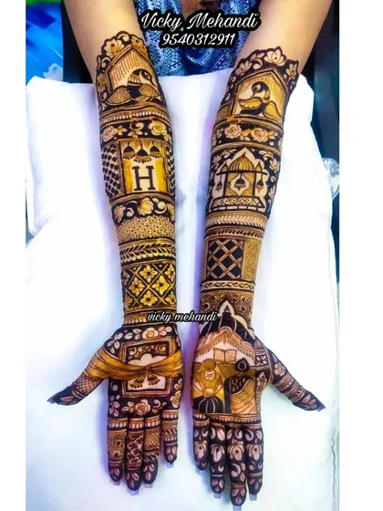 This personalized design for a bride features her initial 'H' prominently, surrounded by beautiful peacock and jharokha motifs.