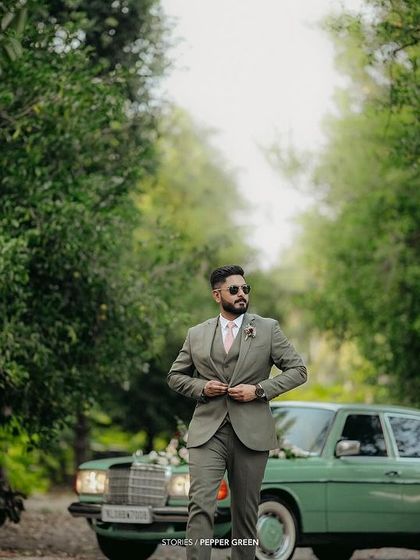 The groom, Richard, looking sharp and confident in front of the vintage car. I also make sure to capture strong solo portraits of the groom.