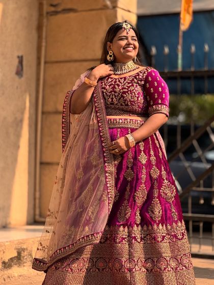 A happy bride-to-be trying out one of my most popular velvet bridal lehengas. The detailed craftsmanship and rich fabric make it a standout piece.