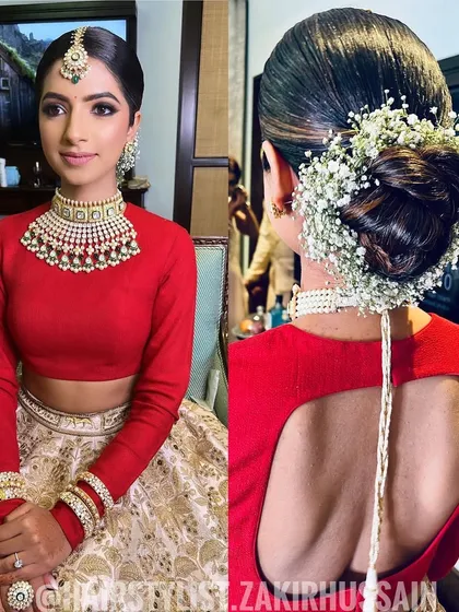 For a classic bridal look, a sleek and clean bun is timeless. Here, I've adorned a perfectly smooth chignon with a traditional baby's breath gajra, creating an elegant and sophisticated style for the main ceremony.