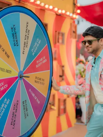 I believe events should be interactive and playful. This custom-designed wheel of fortune for a carnival sangeet was more than just decor; it was an invitation for guests to engage, laugh, and become part of the story themselves.